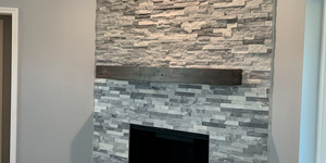 Камень для облицовки печей и каминов в виде 3D панели RKS SLATE Мрамор Cloudy Grey купить, фото после монтажа (1)